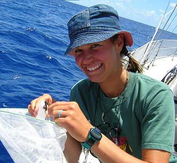Marianne is collecting slouhghed skin from a sperm whale